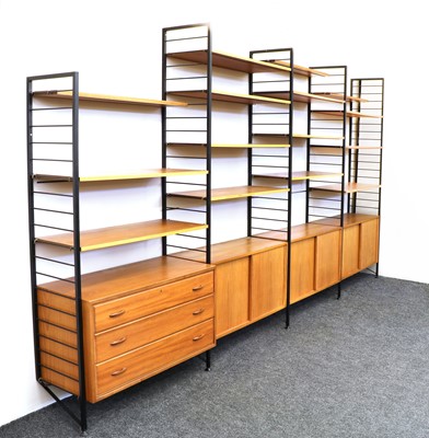 Lot 264 - A Staples' teak and satin black metal Ladderax three-section wall unit