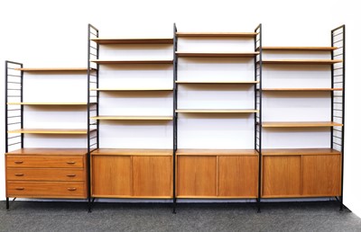 Lot 264 - A Staples' teak and satin black metal Ladderax three-section wall unit