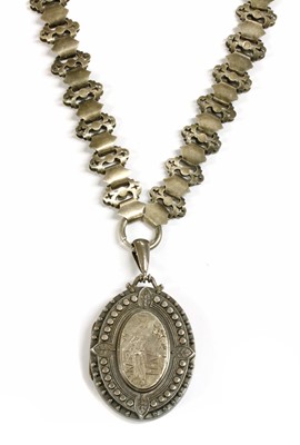 Lot 289 - A Victorian sterling silver locket and collar