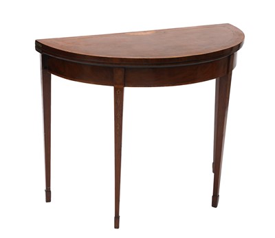 Lot 486 - An Edwardian mahogany demilune fold-over card table