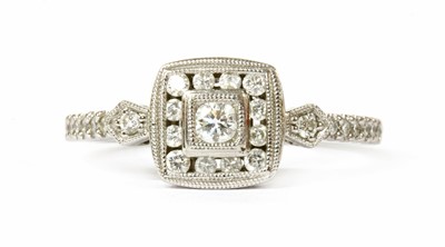 Lot 166 - A white gold diamond cluster ring