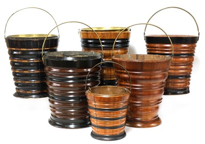 Lot 292 - A collection of five Dutch turned wooden peat buckets