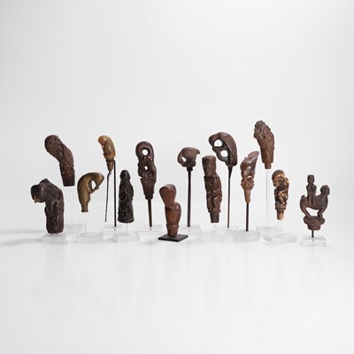 Lot 452 - A collection of fourteen kris hilts