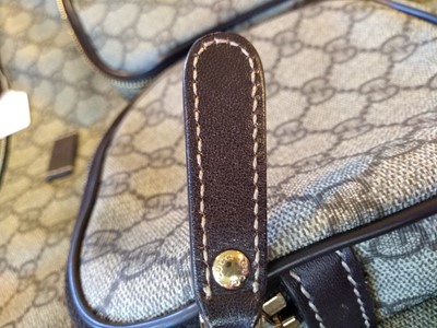 Lot 35 - A Gucci beige coated canvas shoulder bag