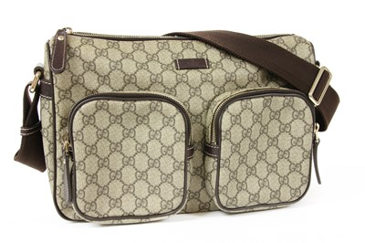 Lot 35 - A Gucci beige coated canvas shoulder bag