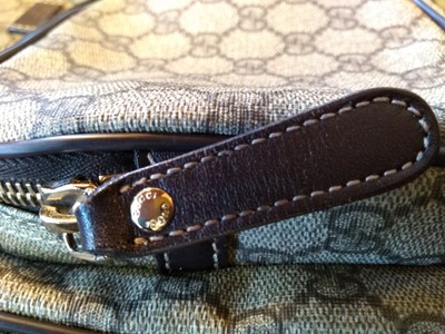 Lot 35 - A Gucci beige coated canvas shoulder bag