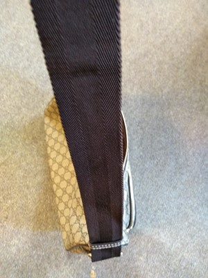 Lot 35 - A Gucci beige coated canvas shoulder bag