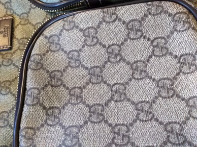 Lot 35 - A Gucci beige coated canvas shoulder bag