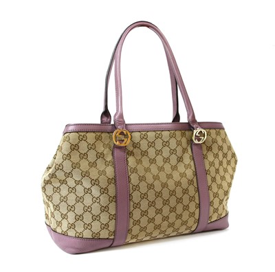 Lot 40 - A Gucci beige monogrammed canvas medium 'Miss' tote