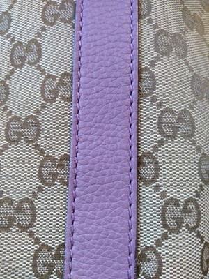 Lot 40 - A Gucci beige monogrammed canvas medium 'Miss' tote