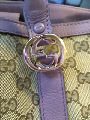 Lot 40 - A Gucci beige monogrammed canvas medium 'Miss' tote
