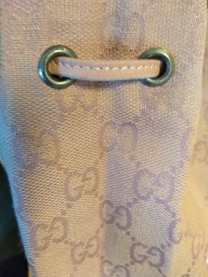 Lot 43 - A Gucci pink monogrammed canvas mini drawstring backpack