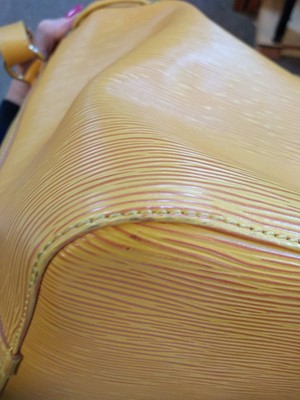 Lot 28 - A Louis Vuitton yellow Epi leather 'Noé' shoulder bag
