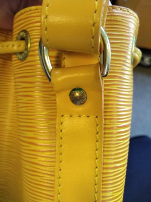 Lot 28 - A Louis Vuitton yellow Epi leather 'Noé' shoulder bag