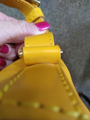 Lot 28 - A Louis Vuitton yellow Epi leather 'Noé' shoulder bag
