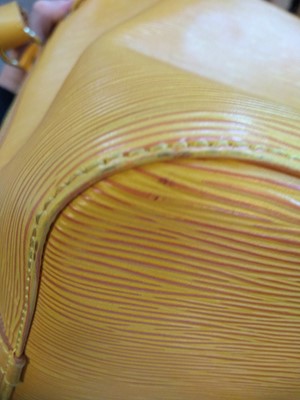 Lot 28 - A Louis Vuitton yellow Epi leather 'Noé' shoulder bag