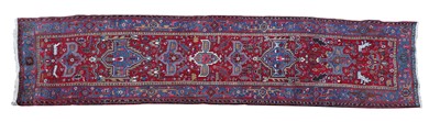 Lot 235 - A Persian Heriz runner