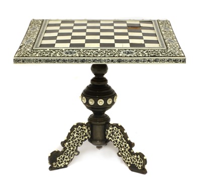 Lot 867 - An Anglo-Indian ivory, horn and sandalwood miniature games table