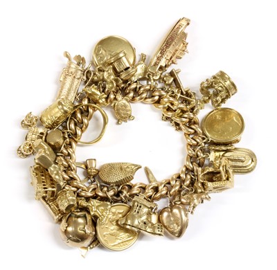 Lot 391 - A gold charm bracelet