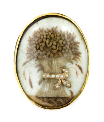 Lot 20 - A Georgian split pearl memorial wheatsheaf glazed panel