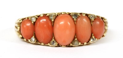 Lot 34 - A Victorian gold five stone coral and diamond ring