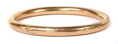 Lot 74 - A 9ct gold bangle