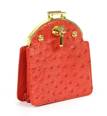 Lot 103 - An Asprey deep coral coloured ostrich leather coin purse