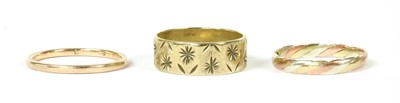 Lot 405 - Three 9ct gold wedding rings