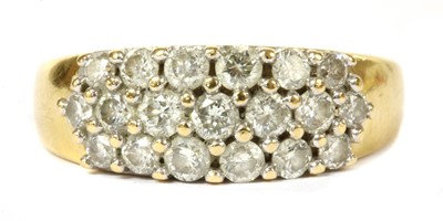 Lot 351 - A gold three row diamond ring