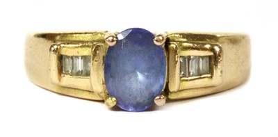 Lot 374 - A gold iolite and diamond ring