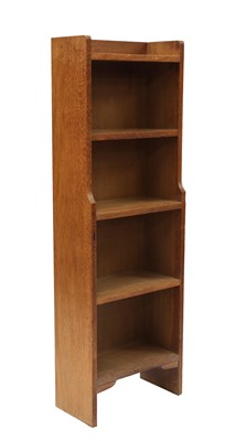 Lot 100 - An oak narrow waterfall bookcase