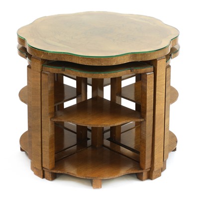 Lot 134 - An Art Deco walnut nest of tables