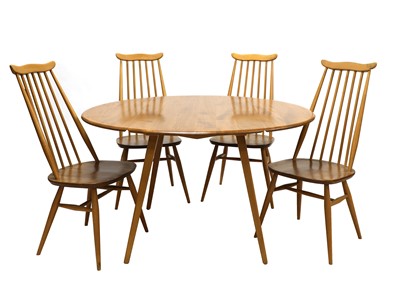 Lot 276 - An Ercol drop-leaf dining table