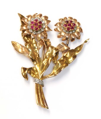 Lot 194 - A three colour gold, ruby and diamond spray brooch, c.1940
