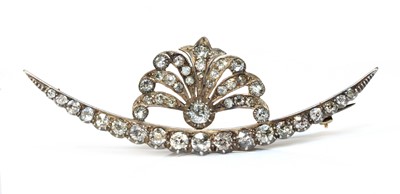 Lot 32 - A late Victorian diamond set crescent and spray brooch, c.1890