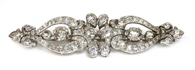Lot 35 - A diamond set bar brooch
