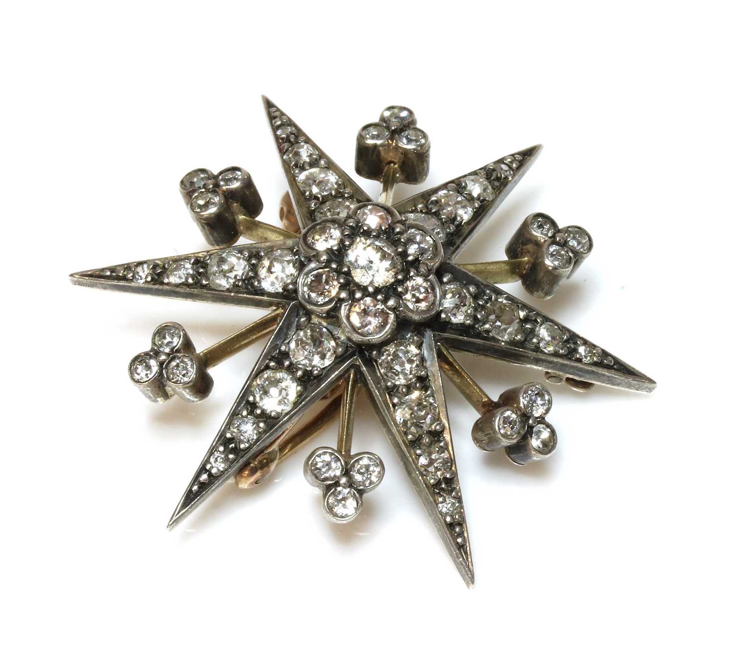 Lot 59 - A late Victorian diamond set star brooch/pendant, c.1890