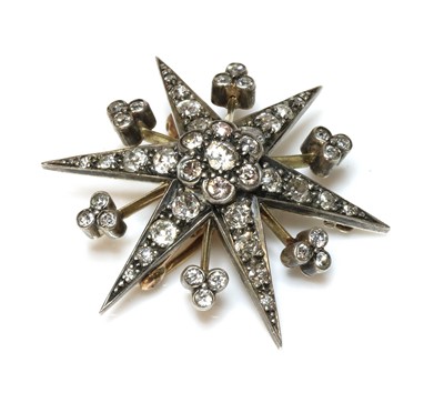Lot 59 - A late Victorian diamond set star brooch/pendant, c.1890