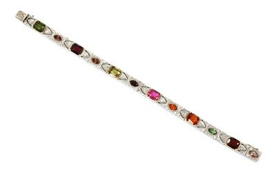Lot 154 - An American Art Deco assorted gemstone and diamond bracelet, c.1925