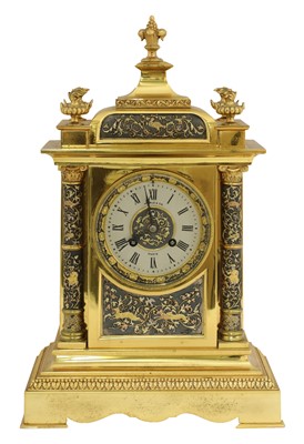 Lot 182 - A French gilt brass cased mantel clock