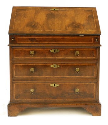 Lot 91 - A yew, crossbanded and feather-banded bureau