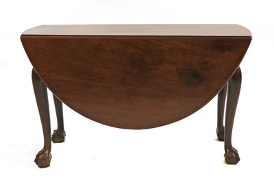 Lot 398 - A mahogany drop-leaf dining table