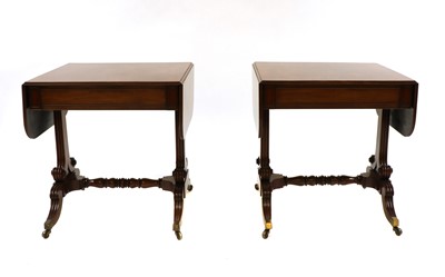 Lot 875 - A pair of Regency mahogany tables