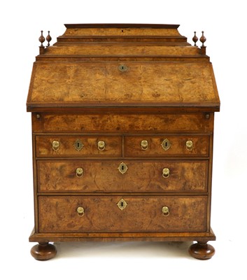 Lot 170 - A walnut and feather banded bureau