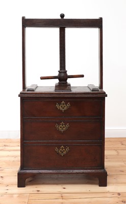 Lot 768 - An oak Norfolk press chest