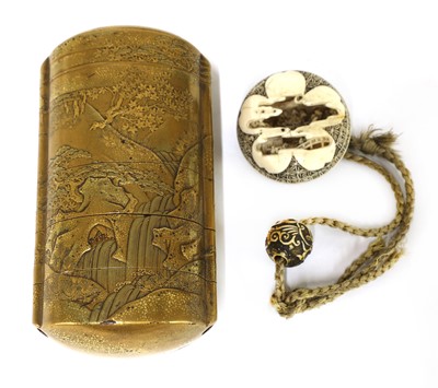 Lot 209 - A Japanese gilt lacquered inro