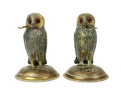 Lot 77 - A pair of gilt metal standing owls
