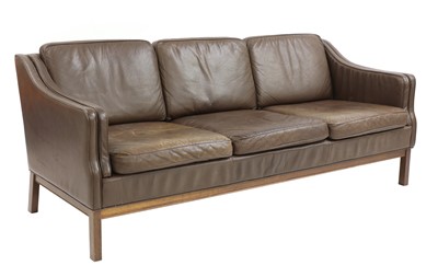 Lot 365 - A Danish brown leather three-seater sofa