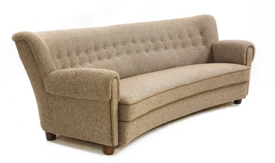 Lot 282 - A Danish curved settee