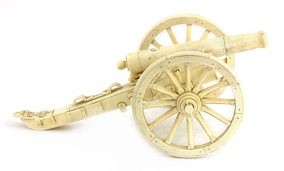 Lot 892 - A good carved bone and ivory model cannon